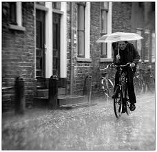 riding bicycle in rain