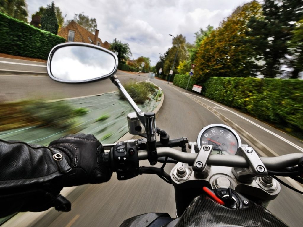 brandon motorcycle accident lawyer - riding motorcycle on 2 lane road